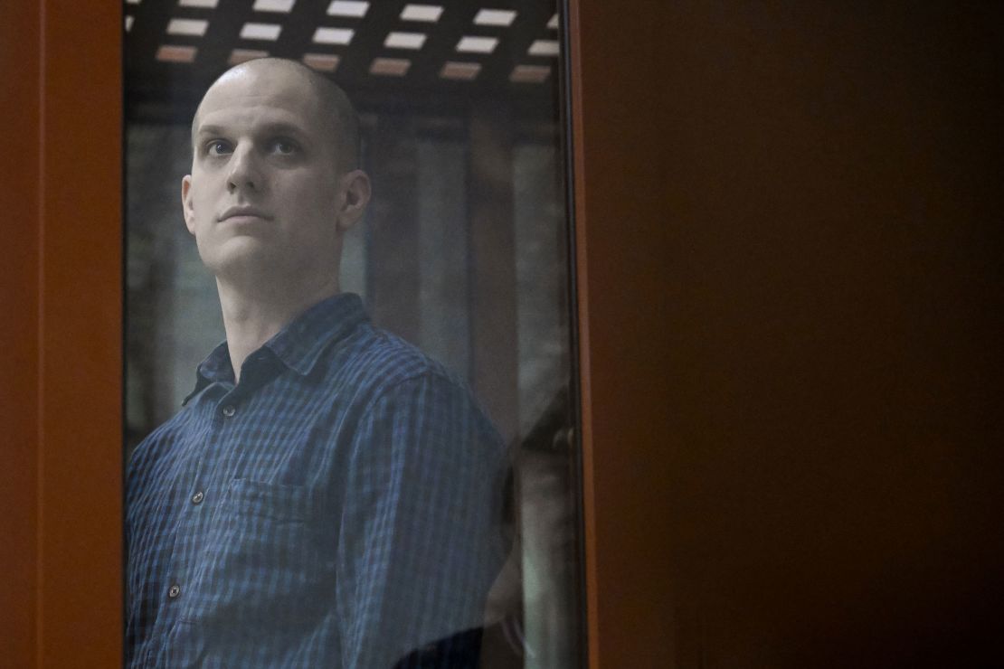 US journalist Evan Gershkovich looks out from inside a glass defendants' cage prior to a hearing in Yekaterinburg's Sverdlovsk Regional Court in Russia on June 26.