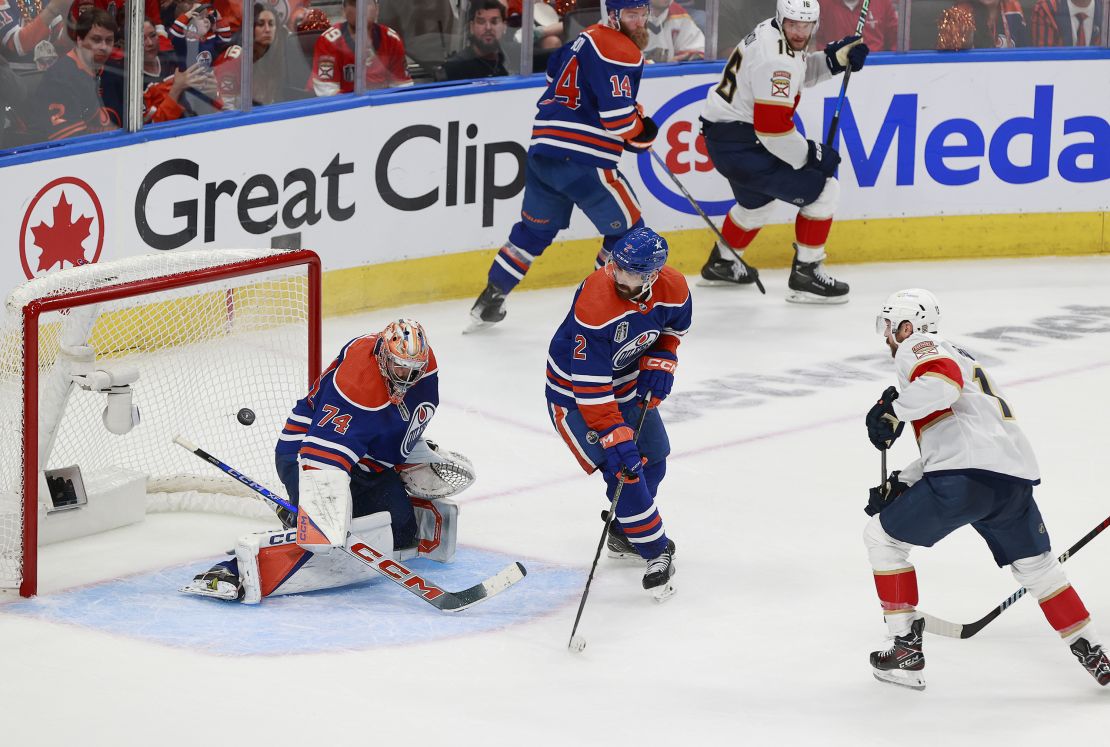Edmonton's Stuart Skinner (left) makes a save from Florida's Sam Reinhart during Game 6 of the Stanley Cup Final.