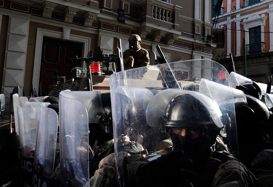 Military police officers stand guard outside Quemado Palace at Plaza Murillo in La Paz on June 26, 2024. Jorge Bernal/AFP/Getty Images