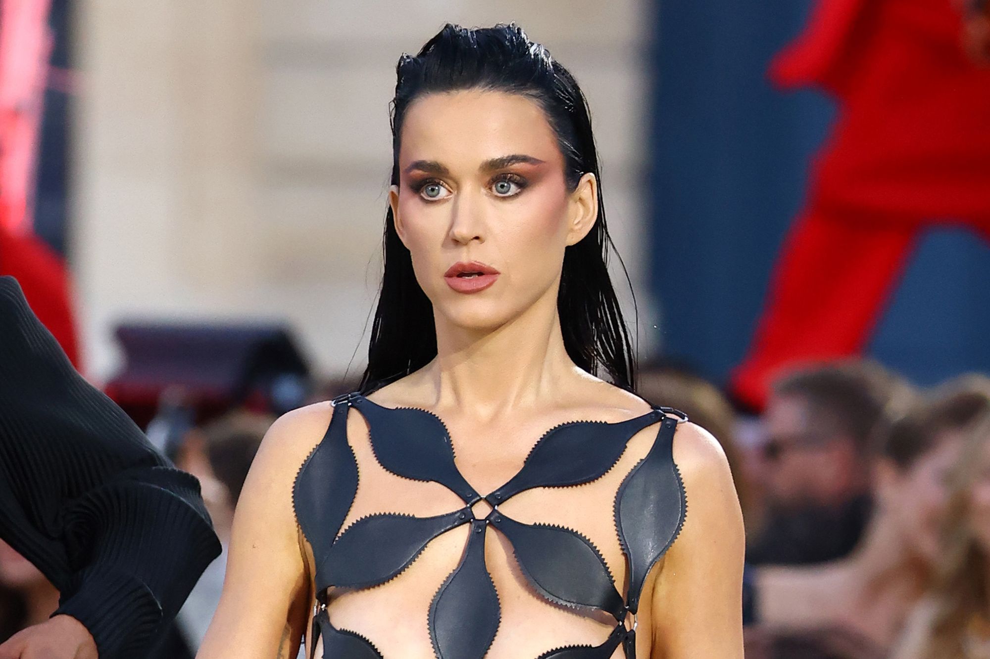 Katy Perry walked the runway in a barely-there cut out gown that was a new take on the naked dressing trend.