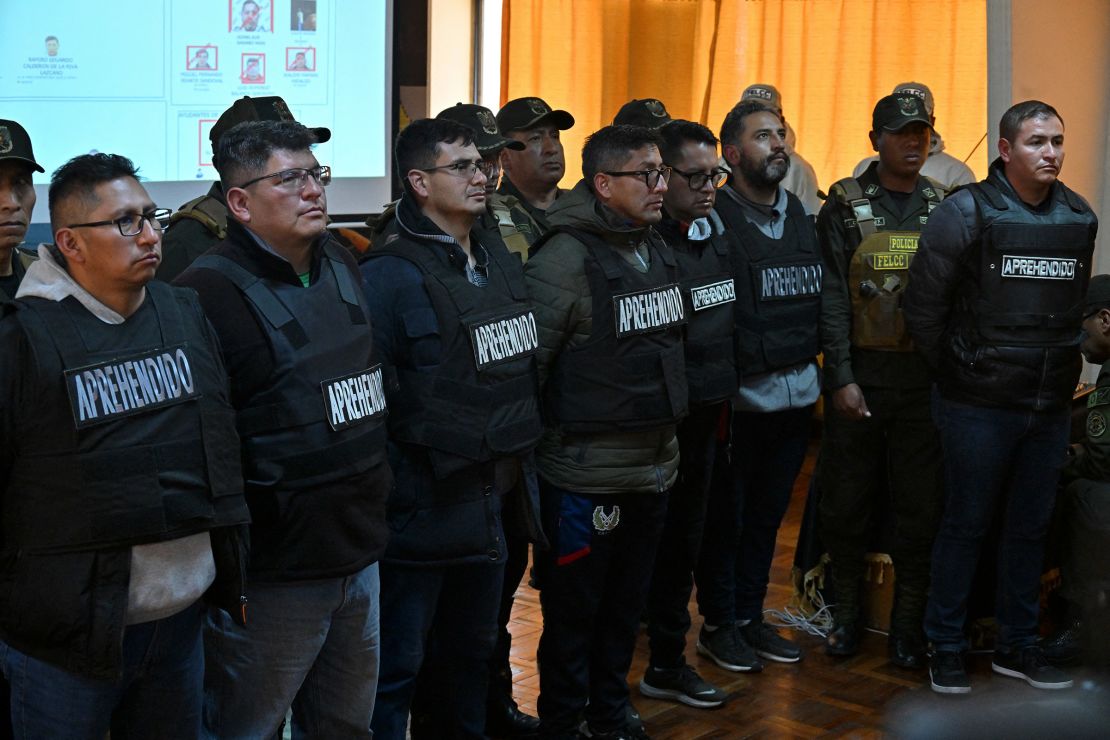 Multiple Bolivian military members are escorted by police following their arrest in La Paz, Bolivia on June 27, 2024. Aizar Raldes/AFP/Getty Images