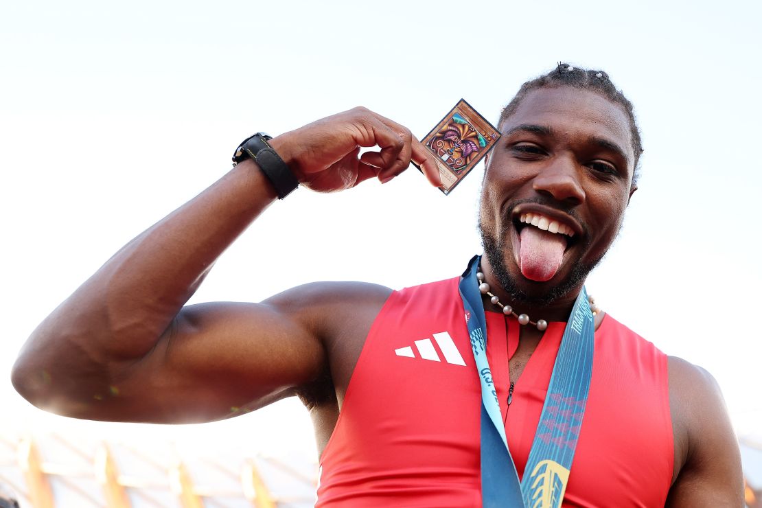 EUGENE, OREGON - JUNE 23: Noah Lyles poses with a Yu Gi Oh card and the gold medal after winning the men's 100 meter final on Day Three 2024 U.S. Olympic Team Trials Track & Field at Hayward Field on June 23, 2024 in Eugene, Oregon. (Photo by Christian Petersen/Getty Images)