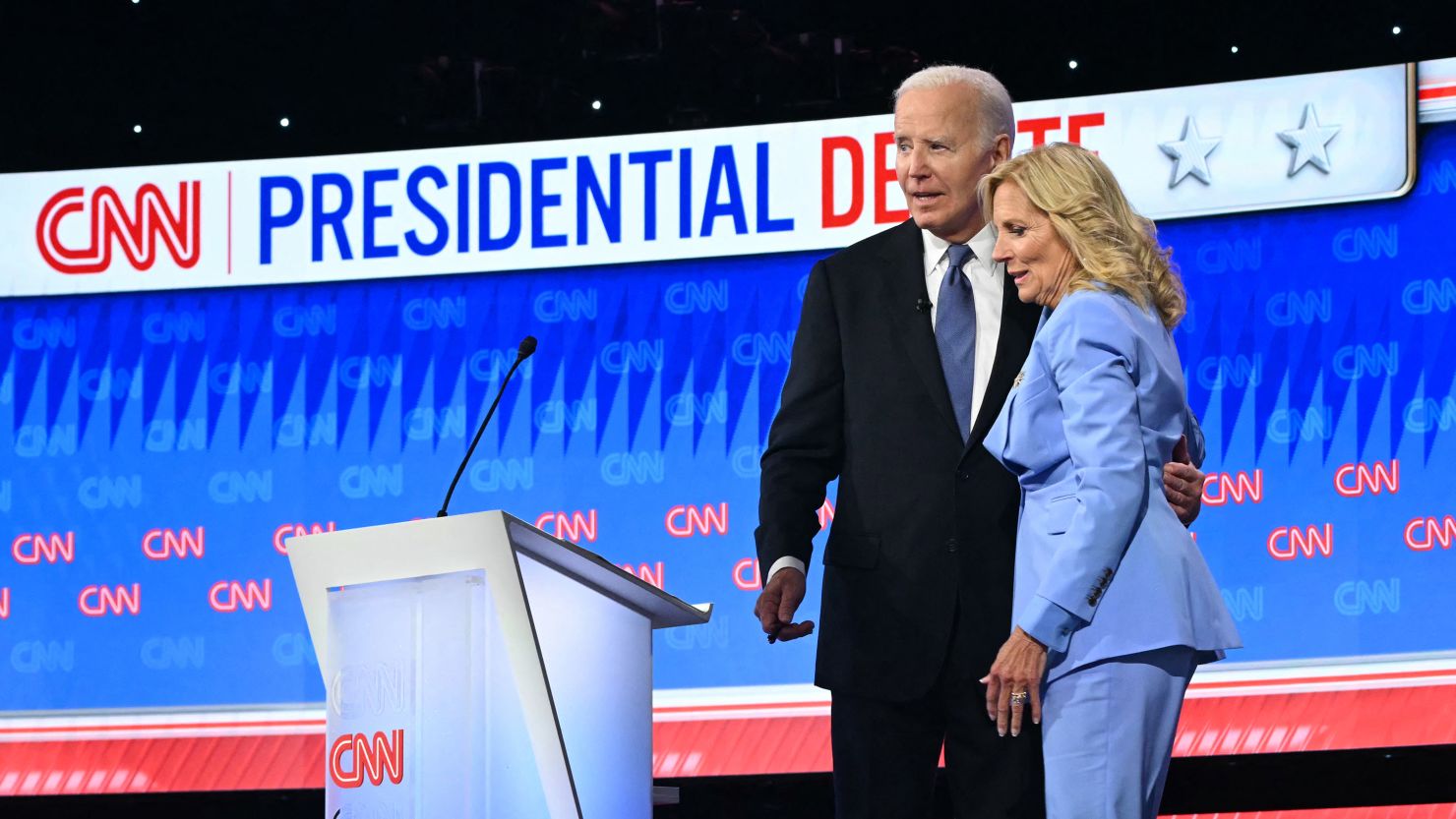 First Lady Jill Biden joins her husband US President Joe Biden on stage at the end of the first presidential debate of the 2024 elections with former US President and Republican presidential candidate Donald Trump at CNN's studios in Atlanta, Georgia, on June 27, 2024. (Photo by ANDREW CABALLERO-REYNOLDS / AFP) (Photo by ANDREW CABALLERO-REYNOLDS/AFP via Getty Images)