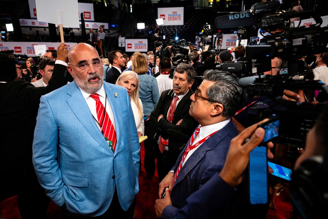 Chris LaCivita, left, speaks to members of the media in Atlanta on June 27.