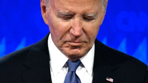 TOPSHOT - US President Joe Biden looks down as he participates in the first presidential debate of the 2024 elections with former US President and Republican presidential candidate Donald Trump at CNN's studios in Atlanta, Georgia, on June 27, 2024. (Photo by Andrew CABALLERO-REYNOLDS / AFP) (Photo by ANDREW CABALLERO-REYNOLDS/AFP via Getty Images)