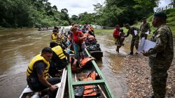 Migrants arrive at the Reception Center for Migrant Care in Lajas Blancas, in the jungle province of Darien, Panama, on June 28, 2024. Panama's president-elect, Jose Raul Mulino, has pledged to close the dangerous Darien Gap, a crucial corridor for migrants from South America, Central America, and Mexico, who seek better opportunities in the United States. Mulino is set to take office on July 1. (Photo by MARTIN BERNETTI / AFP) (Photo by MARTIN BERNETTI/AFP via Getty Images)