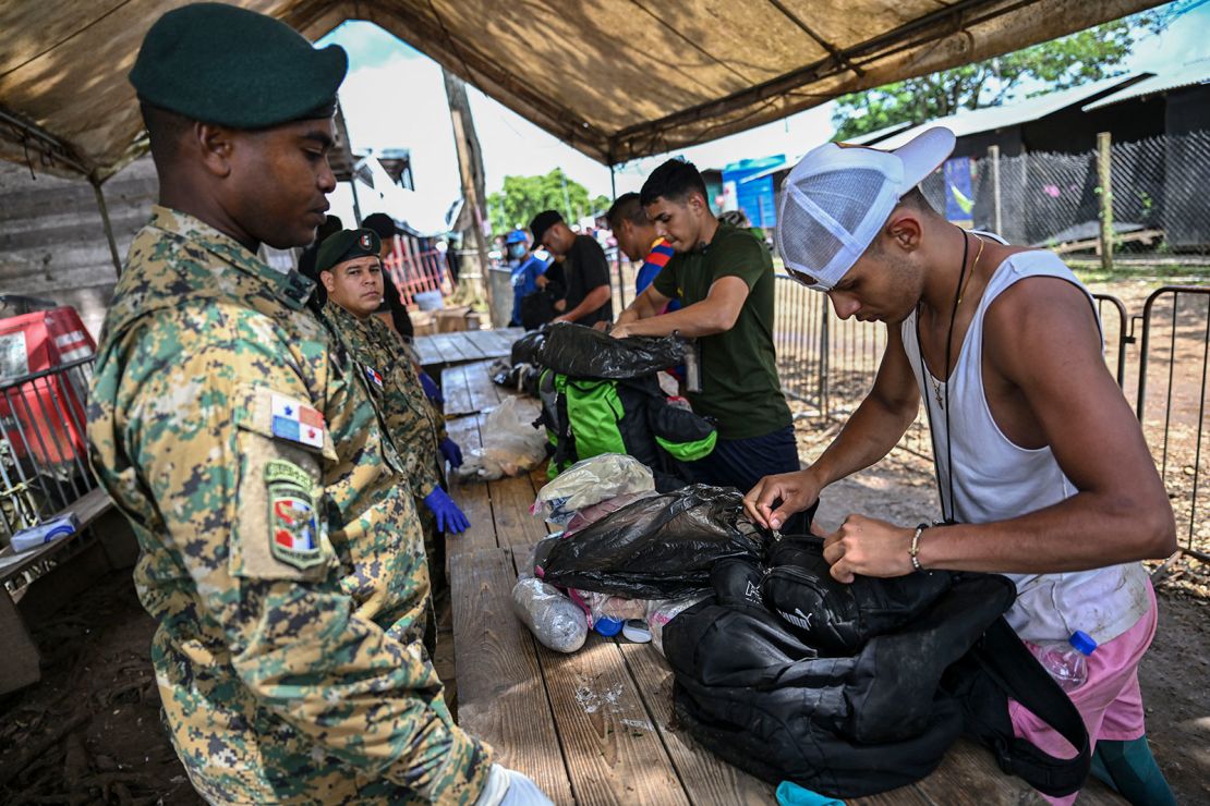 Migrants are being checked upon their arrival at the Reception Center for Migrant Care in Lajas Blancas, in the jungle province of Darien, Panama, on June 28, 2024.