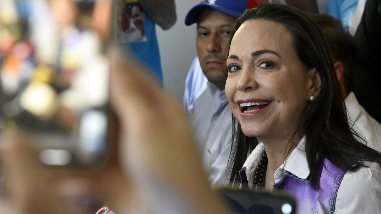 Venezuelan opposition leader Maria Corina Machado greets supporters during a campaign rally in San Cristobal, Tachira state, Venezuela June 28, 2024. Tens of thousands filled one of the main avenues of San Cristobal, in the Andes of Venezuela, accompanying Maria Corina Machado, 'rock star' of the opposition campaign one month before the presidential election in Venezuela. (Photo by Schneyder Mendoza / AFP) (Photo by SCHNEYDER MENDOZA/AFP via Getty Images)