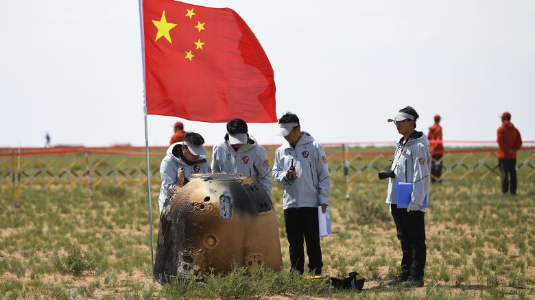 ULANQAB, CHINA - JUNE 25: The return capsule of the Chang'e-6 probe lands in the designated area on June 25, 2024 in Siziwang Banner, Ulanqab City, Inner Mongolia Autonomous Region of China. The returner of the Chang'e-6 probe touched down on Earth on June 25, bringing back the world's first samples collected from the moon's far side. (Photo by Menghe Zhaoru/VCG via Getty Images)
