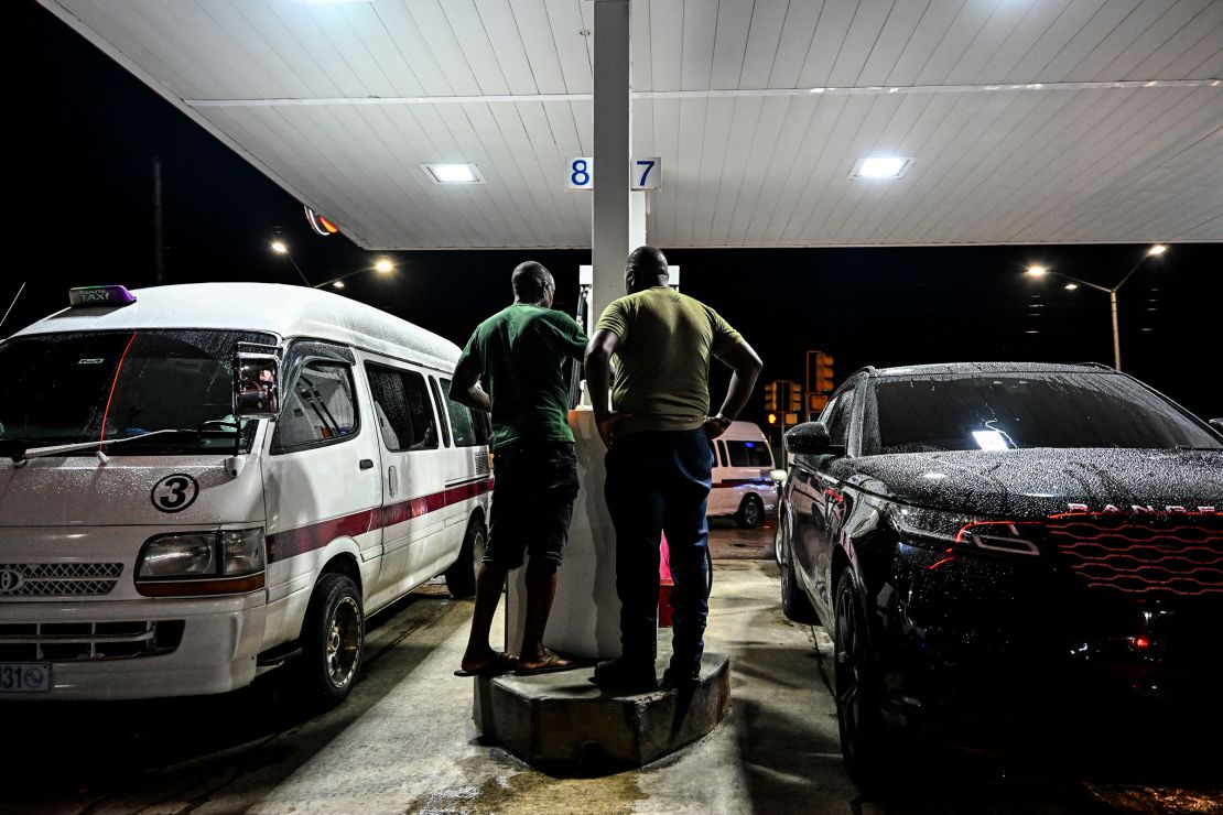 Cars line up at a gas station Saturday in Bridgetown, Barbados, as hurricane Beryl approaches.