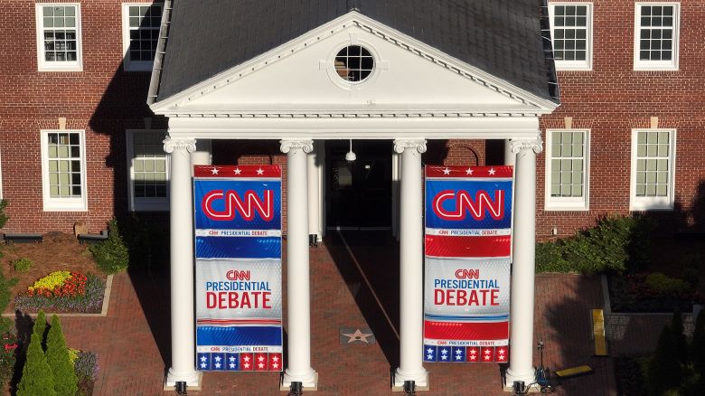 In an aerial view, signage for a CNN presidential debate is seen outside of their studios inside the Turner Entertainment Networks on June 26, 2024 in Atlanta, Georgia. U.S. President Joe Biden and Republican presidential candidate, former U.S. President Donald Trump will face off in the first presidential debate of the 2024 presidential cycle this Thursday.