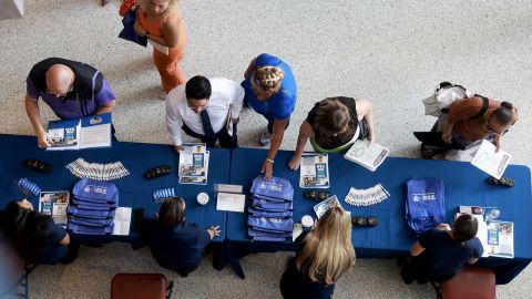 Job seekers attend the South Florida Job Fair on June 26 in Sunrise, Florida.