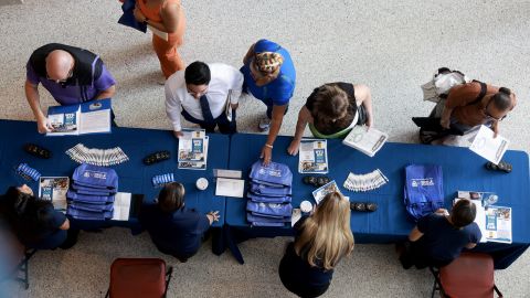 Job seekers attend a job fair on June 26 in Sunrise, Florida.