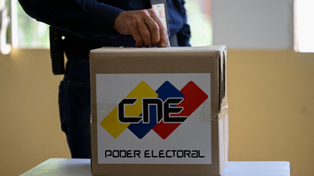 A man votes at a polling station during a mock election in Caracas on June 30, 2024. Venezuela held on Sunday a rehearsal for the July 28 presidential elections, in which President Nicolas Maduro will seek a third six-year term. (Photo by Federico PARRA / AFP) (Photo by FEDERICO PARRA/AFP via Getty Images)