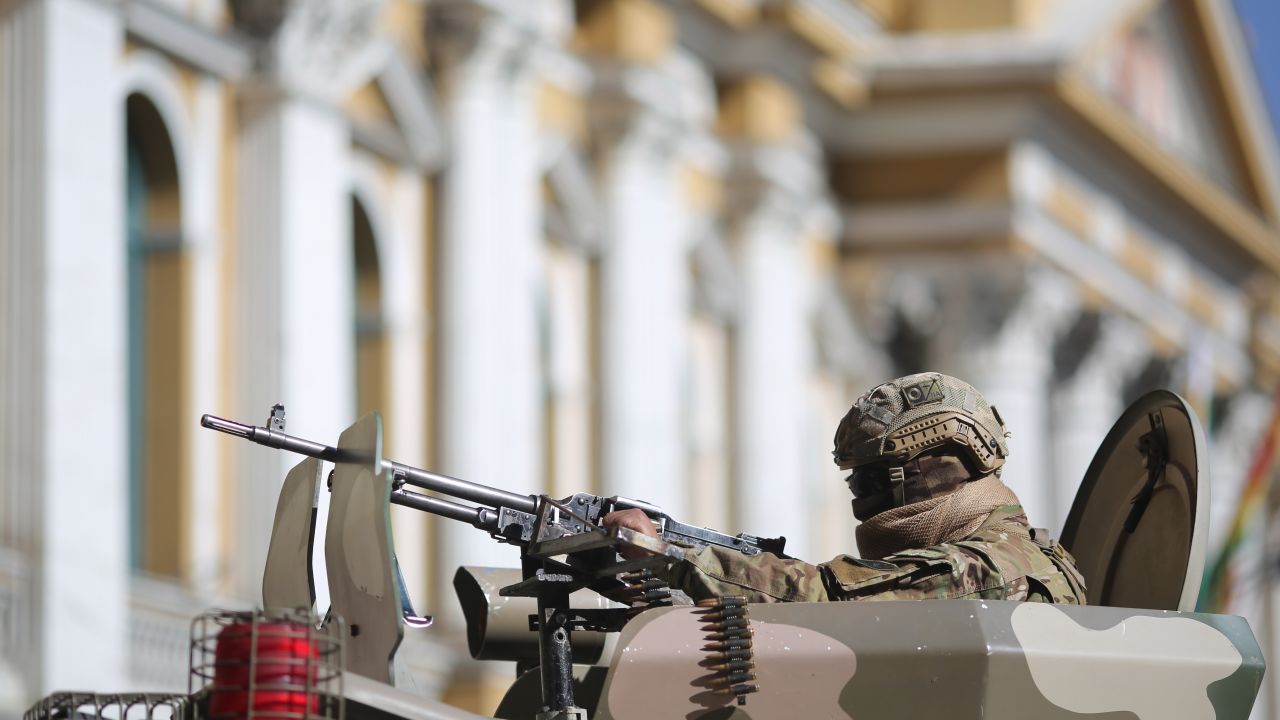 LA PAZ, BOLIVIA - JUNE 26: A military officer operates a tank at Plaza Murillo on June 26, 2024 in La Paz, Bolivia. President of Bolivia Luis Arce warned about irregular movements of military troops and raises the alert of a possible Coup d'état. (Photo by Gaston Brito Miserocchi/Getty Images)