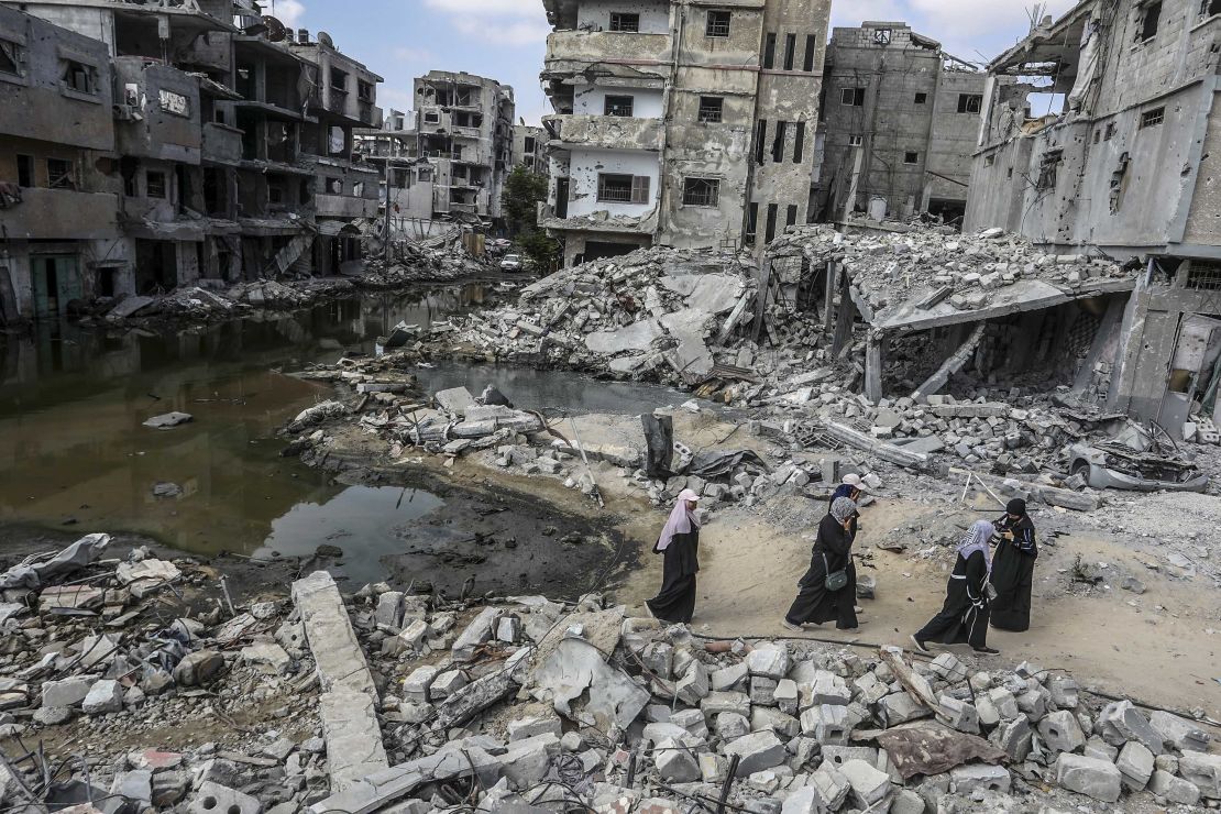 Wastewater, rubble and destroyed residential buildings in Khan Younis, Gaza on Saturday.