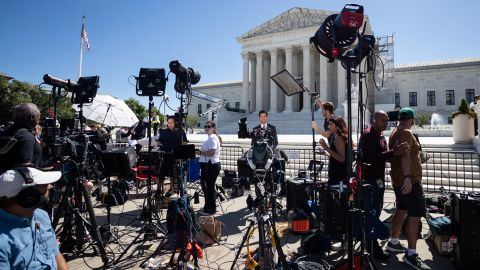 News outlets stage in front of the U. S. Supreme Court as it issues the last remaining opinions of the term, including a decision on Donald Trump's immunity from prosecution for the January 6, 2021, Capitol insurrection, Washington, DC, July 1, 2024.  The Trump opinion held that Presidents have immunity for "official acts," but did not determine if Trump's role in the insurrection was an official act. (Photo by Allison Bailey / Middle East Images / Middle East Images via AFP) (Photo by ALLISON BAILEY/Middle East Images/AFP via Getty Images)