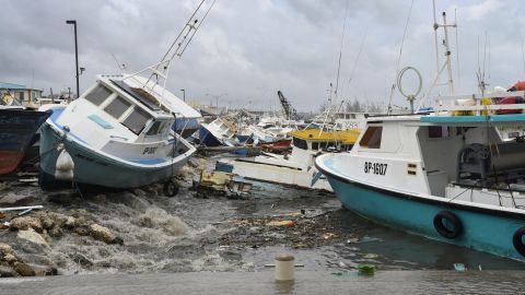 Damaged fishing boats rest on the shore after the passing of Hurricane Beryl at the Bridgetown Fish Market, Bridgetown, Barbados on July 1, 2024. (Photo by Randy Brooks / AFP)