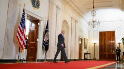 US President Joe Biden walks to deliver remarks on the Supreme Court's immunity ruling at the Cross Hall of the White House in Washington, DC on July 1, 2024. The US Supreme Court ruled July 1, 2024 that Donald Trump enjoys some immunity from prosecution as a former president, a decision set to delay his trial for conspiring to overturn the 2020 election.