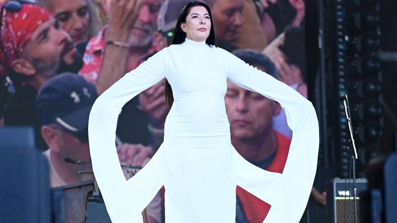 GLASTONBURY, ENGLAND - JUNE 28: Marina Abramović performing 'Seven Minutes of Collective Silence' during day three of Glastonbury Festival 2024 at Worthy Farm, Pilton on June 28, 2024 in Glastonbury, England. Founded by Michael Eavis in 1970, Glastonbury Festival features around 3,000 performances across over 80 stages. Renowned for its vibrant atmosphere and iconic Pyramid Stage, the festival offers a diverse lineup of music and arts, embodying a spirit of community, creativity, and environmental consciousness. (Photo by Joe Maher/Getty Images)