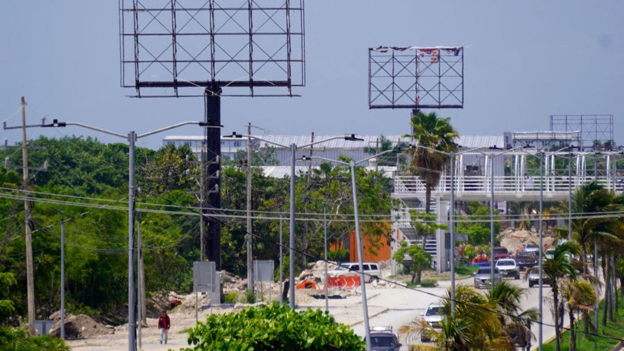 Advertising billboards are taken down in anticipation of the potential arrival of Hurricane Beryl in Cancun, Quintana Roo State, Mexico, on July 3, 2024. Powerful Hurricane Beryl churned along Jamaica's southern coast on Wednesday, battering the island with dangerous winds and sea surge after leaving a trail of destruction and at least seven people dead in the Caribbean. (Photo by Elizabeth Ruiz / AFP) (Photo by ELIZABETH RUIZ/AFP via Getty Images)