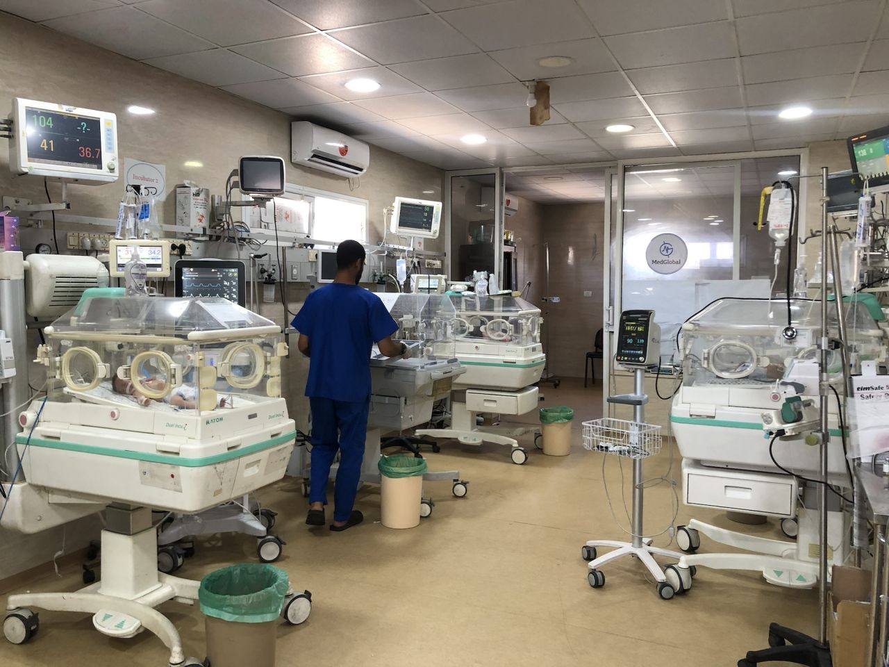 Medical staff are seen examining newborns at Kamal Adwan Hospital in Gaza on June 28.