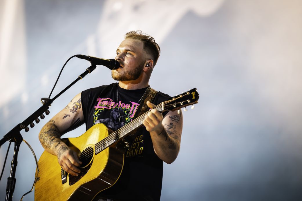 Zach Bryan performs during the Quittin Time tour at Nissan Stadium on June 29, 2024 in Nashville, Tennessee.