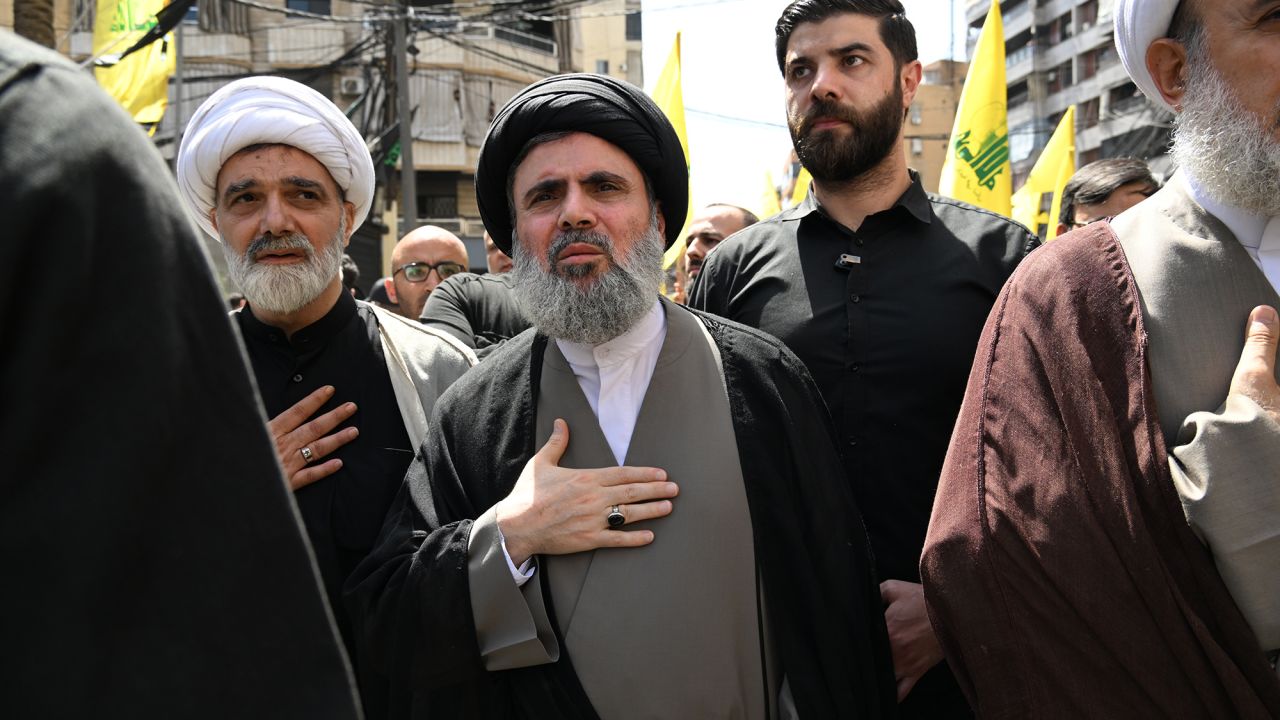 Hashem Safieddine, center, attends the funeral ceremony of Hezbollah military commander Mohamed Naim Nasser in Beirut, in July.