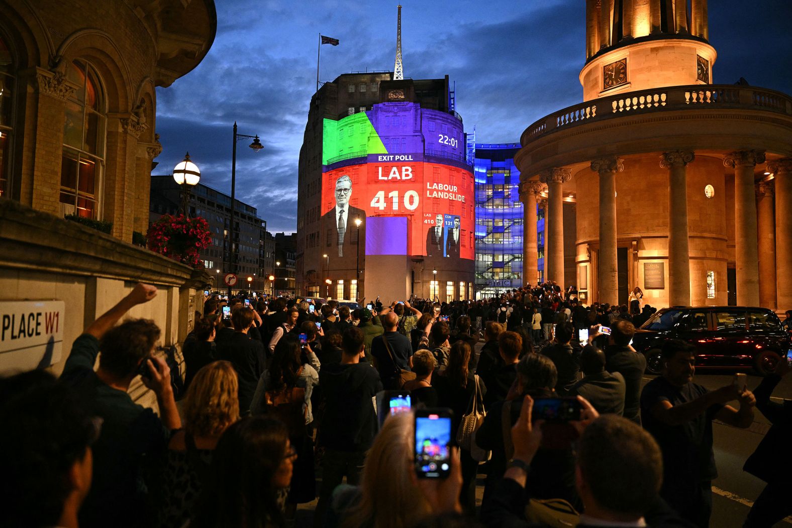 Exit poll results are projected onto the BBC Broadcasting House in London on Thursday, July 4. A major exit poll indicated that the center-left Labour Party <a href="index.php?page=&url=https%3A%2F%2Fwww.cnn.com%2F2024%2F07%2F04%2Fuk%2Fuk-election-exit-poll-results-labour-conservative-starmer-gbr-intl%2Findex.html">will win Britain's general election by a landslide</a>, ending a 14-year era of Conservative rule in decisive fashion and putting its leader <a href="index.php?page=&url=http%3A%2F%2Fwww.cnn.com%2F2024%2F07%2F04%2Fuk%2Fgallery%2Fkeir-starmer%2Findex.html">Keir Starmer</a> on course to become prime minister.