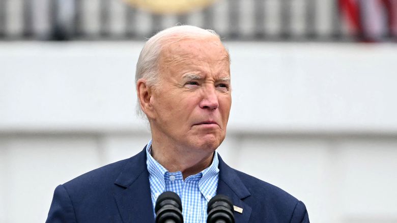 President Joe Biden looks on as he speaks during a barbecue for active-duty military families, in honor of the Fourth of July, on the South Lawn of the White House in Washington, DC, on July 4, 2024.