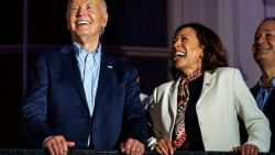 WASHINGTON, DC - JULY 04: President Joe Biden and Vice President Kamala Harris laugh as they view the fireworks on the National Mall from the White House balcony during a 4th of July event on the South Lawn of the White House on July 4, 2024 in Washington, DC. The President is hosting the Independence Day event for members of the military and their families. (Photo by Samuel Corum/Getty Images)