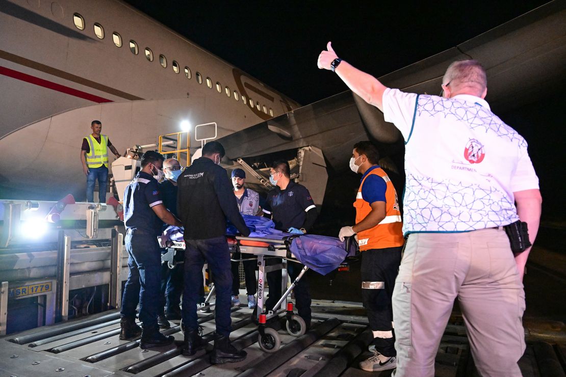 An injured Palestinian evacuated from the Gaza Strip is transported to an Emirati aircraft at Egypt's Arish airport, to receive treatment in the United Arab Emirates, on July 5.