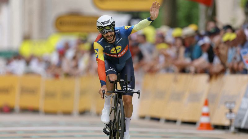 Tour de France: French cyclist Julien Bernard fined after stopping to kiss his wife | CNN