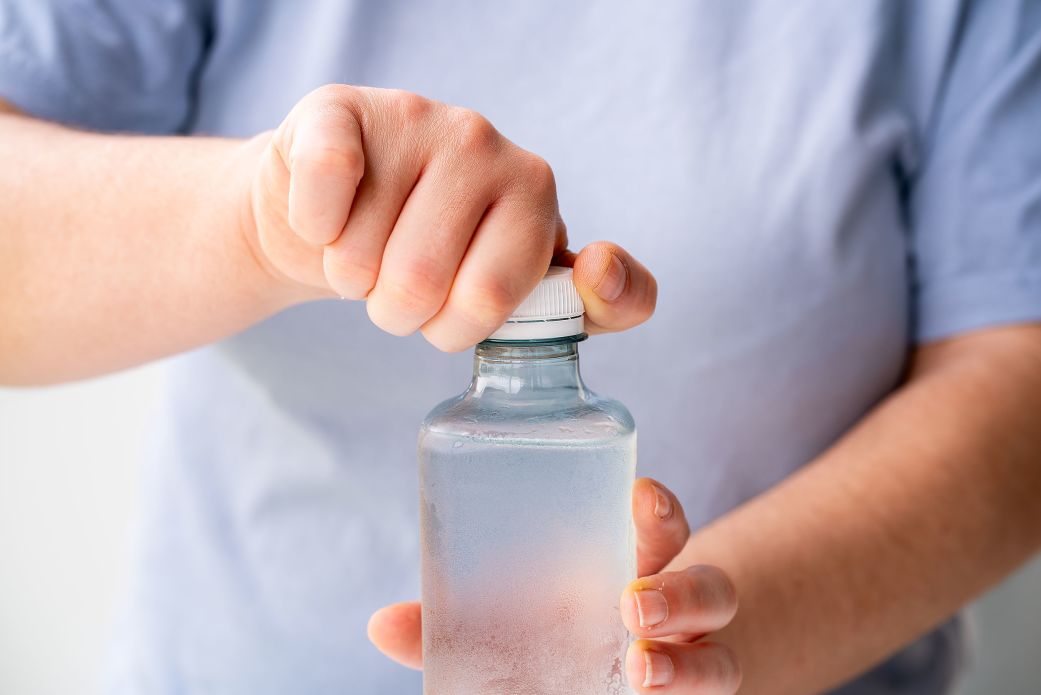 Opening and closing plastic bottle caps can release microplastics into a drink, a new study found.