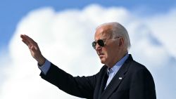 TOPSHOT - US President Joe Biden waves as he boards Air Force One prior to departure from Dane County Regional Airport in Madison, Wisconsin, July 5, 2024, as he travels to Wisconsin for campaign events. (Photo by SAUL LOEB / AFP) (Photo by SAUL LOEB/AFP via Getty Images)