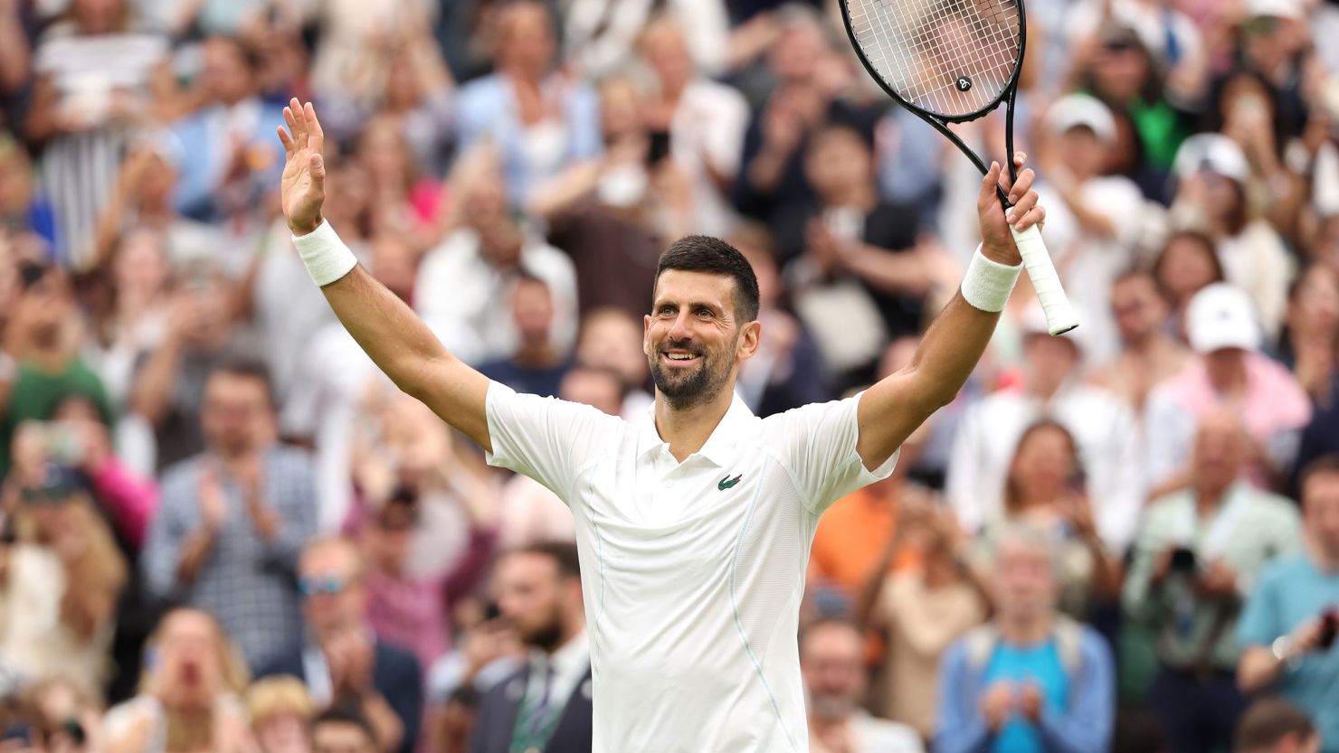 Novak Djokovic celebrates winning match point against Vit Kopřiva at Wimbledon.
