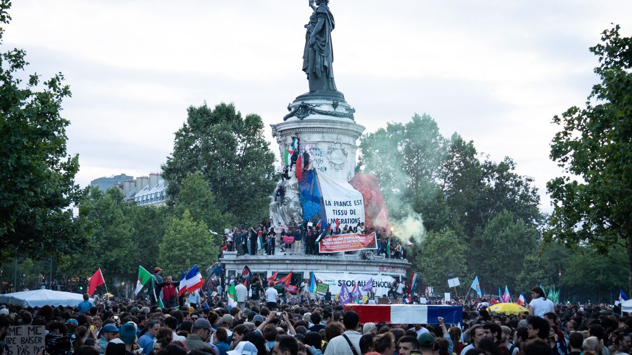 Demonstrators take part in a rally following the first results of the second round of France s legislative election at Place de la Republique in Paris, France on July 7, 2024. (Photo by Mathilde Kaczkowski / Hans Lucas / Hans Lucas via AFP) (Photo by MATHILDE KACZKOWSKI/Hans Lucas/AFP via Getty Images)