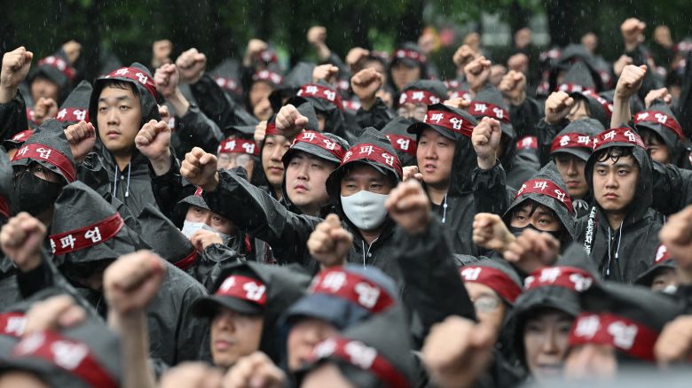 Members of the National Samsung Electronics Union stage a rally as they begin a three-day general strike outside the company's foundry and semiconductor factory in Hwaseong on July 8, 2024.