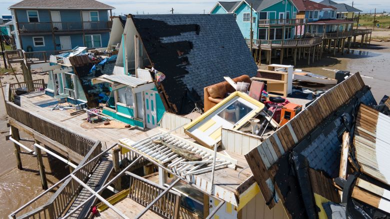 TOPSHOT - An aerial view shows a destroyed home in Surfside Beach, Texas, on July 8, 2024, after Hurricane Beryl made landfall. Hurricane Beryl made landfall July 8 in the southern US state of Texas, killing at least two people and causing millions to lose power amid dangerous winds and flooding, as some coastal areas remained under evacuation orders. (Photo by Mark Felix / AFP) (Photo by MARK FELIX/AFP via Getty Images)