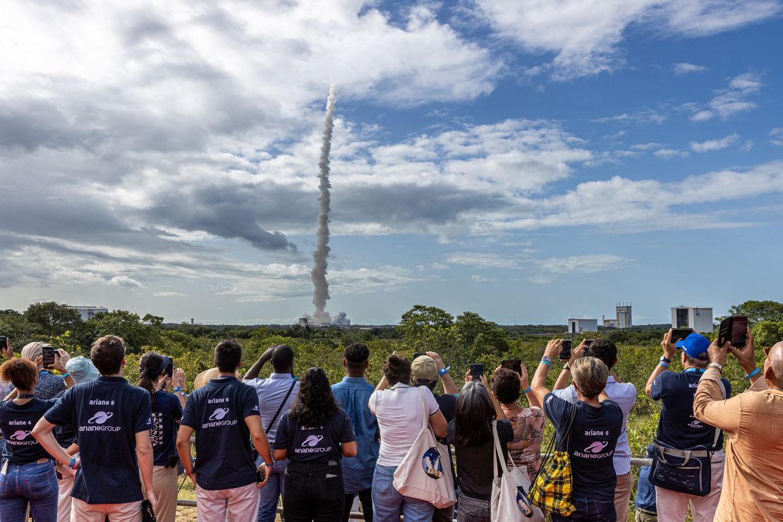 Spectators watch the takeoff of the Ariane 6 rocket from its launchpad at the Guiana Space Center on Tuesday.