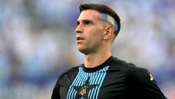 Argentina's goalkeeper #23 Emiliano Martinez warms up ahead of the Conmebol 2024 Copa America tournament semi-final football match between Argentina and Canada at MetLife Stadium, in East Rutherford, New Jersey on July 9, 2024. (Photo by JUAN MABROMATA / AFP) (Photo by JUAN MABROMATA/AFP via Getty Images)