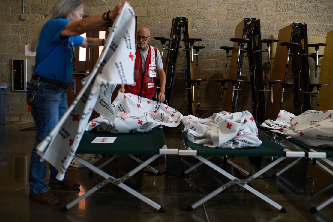 American Red Cross workers prepare cots in Houston, Texas, on Wednesday.