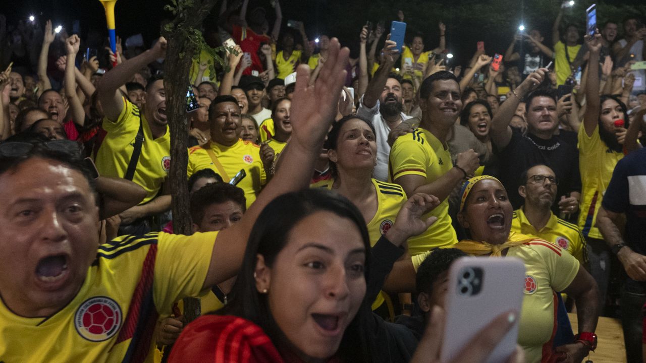 Colombian fans celebrate their team's victory after the 2024 Copa America semi-final football match between Uruguay and Colombia in Cali, Colombia on July 10, 2024. Ten-man Colombia defeated Uruguay 1-0 to reach the final of the Copa America for the first time in 23 years after an ill-tempered semi-final. (Photo by JOAQUIN SARMIENTO / AFP) (Photo by JOAQUIN SARMIENTO/AFP via Getty Images)