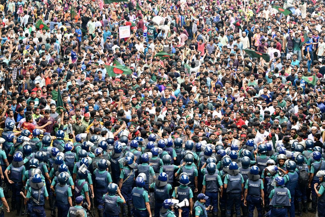 Students scuffle with police during a protest in Dhaka on July 11, 2024.
