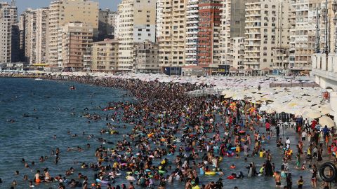 Beachgoers crowd a beach in Egypt's Mediterranean city of Alexandria on July 11, 2024.  (Photo by Hazem GOUDA / AFP) (Photo by HAZEM GOUDA/AFP via Getty Images)