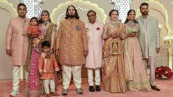 TOPSHOT - Billionaire tycoon and Chairman of Reliance Industries Mukesh Ambani (C) with his wife Nita Ambani (3R), daughter Isha Ambani (2R), sons Akash Ambani (L) and Anant Ambani (C, left), daughter-in-law Shloka Mehta (2L), and son-in-law Anand Piramal pose for photos as they arrive to attend the wedding ceremony of Anant and Radhika Merchant in Mumbai on July 12, 2024. Socialite sisters Kim and Khloe Kardashian were among the global celebrities spotted in India on July 12 to attend a lavish three-day wedding ceremony staged by Asia's richest man Mukesh Ambani. Ambani's youngest son Anant and fiancee Radhika Merchant, both 29, will tie the knot over the weekend in the financial capital Mumbai following months of pre-marriage parties that have set a new benchmark in matrimonial extravagance. (Photo by SUJIT JAISWAL / AFP) (Photo by SUJIT JAISWAL/AFP via Getty Images)