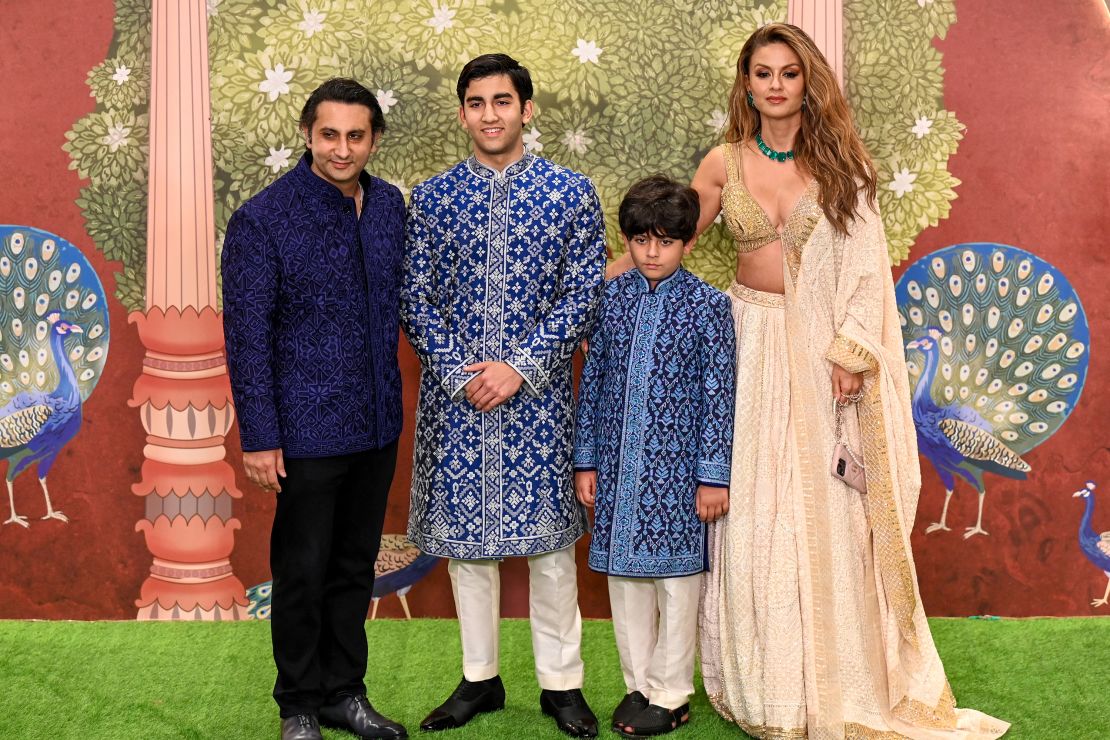 Chief Executive Officer (CEO) of Serum Institute of India (SII) Adar Poonawalla (L) with his wife Natasha Poonawalla (R) and their children poses as they arrive at the blessing ceremony of billionaire Mukesh Ambani's son Anant Ambani and Radhika Merchant, after their wedding in Mumbai on July 13, 2024. Lavish wedding celebrations for the son of Asia's richest man resumed July 13 with a star-studded guest list including Hollywood celebrities, global business leaders and two former British prime ministers. (Photo by Punit PARANJPE / AFP) (Photo by PUNIT PARANJPE/AFP via Getty Images)