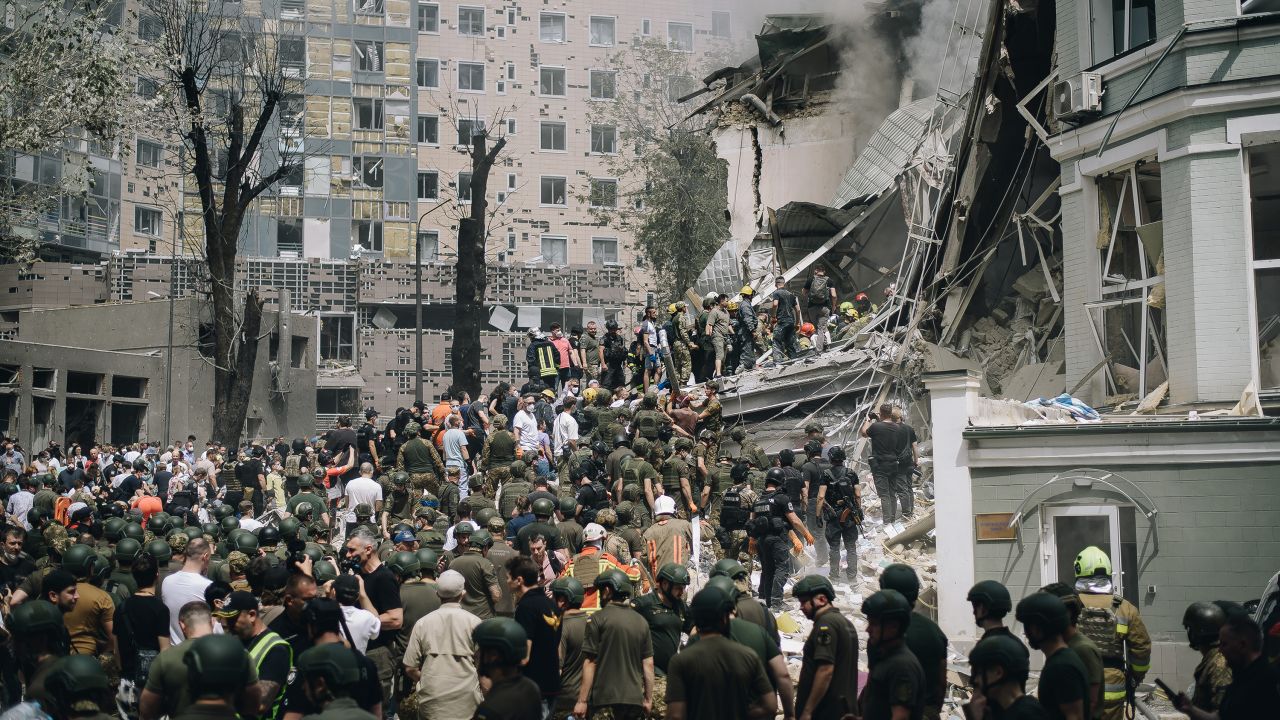 KYIV, UKRAINE - JULY 8: People clear rubble from a building of one of the largest children’s hospitals of Ukraine, ‘Okhmatdyt’, partially destroyed by a Russian missile strike on July 8, 2024 in Kyiv, Ukraine. In the morning, the Russian army carried out a mass missile attack on the Ukrainian cities of Kyiv, Dnipro, Kryvyi Rih, Sloviansk, Kramatorsk, using more than 40 missiles of various types. In Kyiv, residential buildings, infrastructure facilities and children’s hospital ‘Okhmatdyt’ were damaged. Rescuers continue to search for people under the rubble. (Photo by Valentyna Polishchuk/Global Images Ukraine via Getty Images)