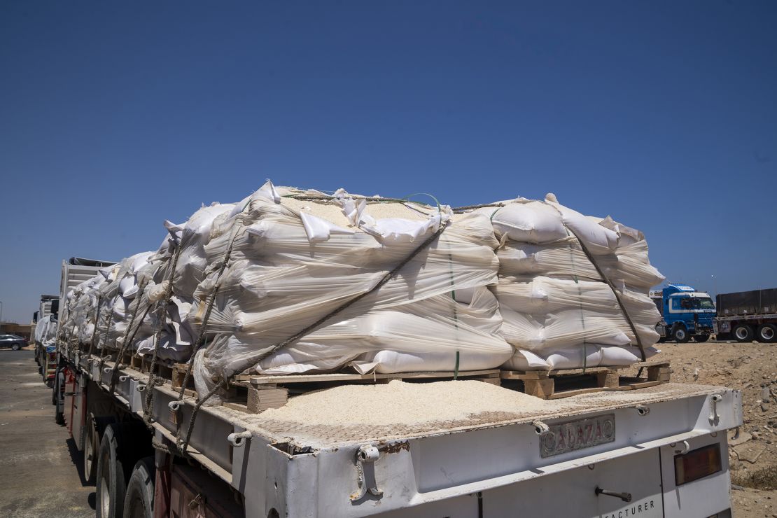 Aid trucks loaded with supplies for Gaza are queued in Arish after the Rafah border crossing closed, in Arish, Egypt on Tuesday.