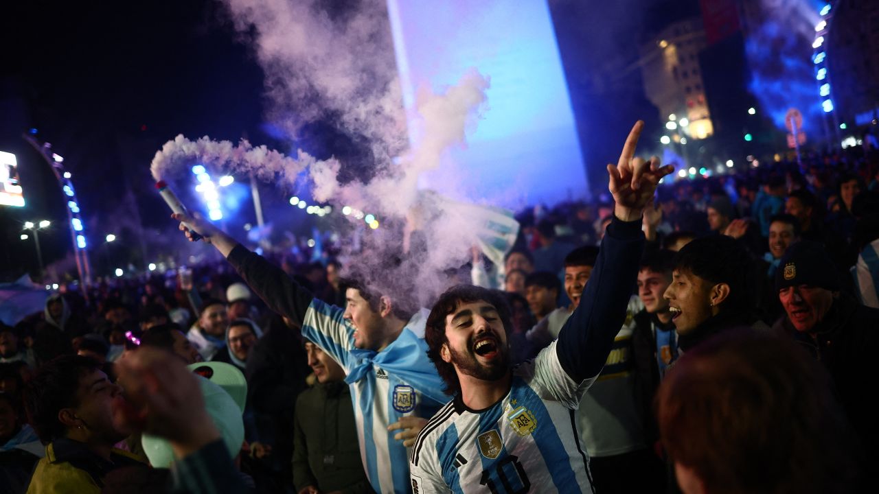 Argentinian fans celebrate after Argentina won the 2024 Copa America final football match between Argentina and Colombia, in Buenos Aires on July 14, 2024. (Photo by Tomas CUESTA / AFP) (Photo by TOMAS CUESTA/AFP via Getty Images)